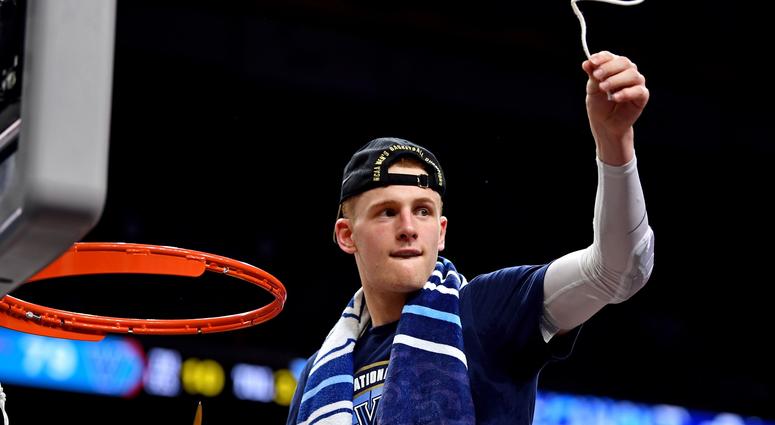 Villanova Wildcats guard Donte DiVincenzo cuts down the net after beating the Michigan Wolverines in the championship game of the 2018 men's Final Four at Alamodome. Villanova Wildcats guard Donte DiVincenzo cuts down the net after beating the Michigan Wolverines in the championship game of the 2018 men's Final Four at Alamodome.