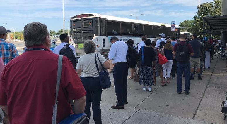 The shuttle in Lindenwold, N.J., did not have enough seats for all the people waiting. The shuttle in Lindenwold, N.J., did not have enough seats for all the people waiting.