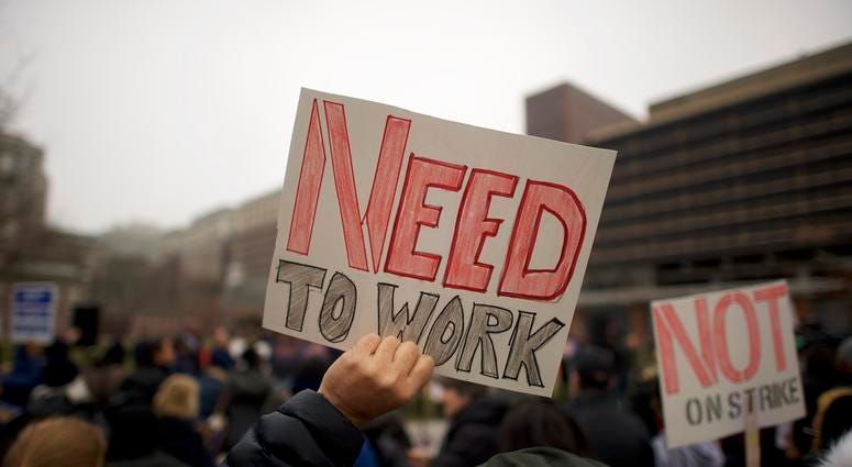 Fred Jennings, 67, holds a placard stating "NEED TO WORK" while gathering with area elected officials and furloughed federal workers at a rally in front of Independence Hall on Jan. 8, 2019 in Philadelphia, Pennsylvania. Fred Jennings, 67, holds a placard stating "NEED TO WORK" while gathering with area elected officials and furloughed federal workers at a rally in front of Independence Hall on Jan. 8, 2019 in Philadelphia, Pennsylvania.