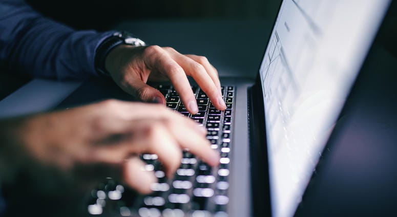 Close up of hands typing on laptop. Close up of hands typing on laptop.