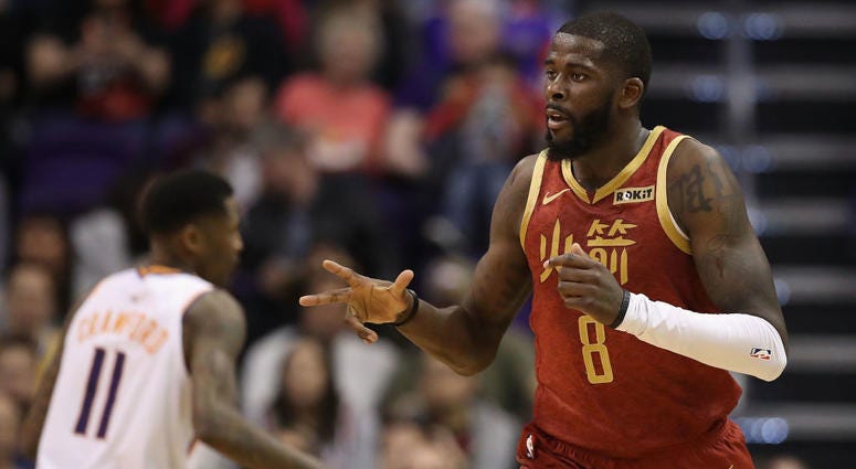 James Ennis III #8 of the Houston Rockets reacts after hitting a three-point shot against the Phoenix Suns during the second half of the NBA game at Talking Stick Resort Arena on Feb. 4, 2019 in Phoenix, Arizona. James Ennis III