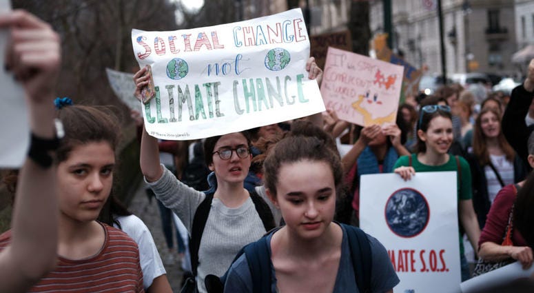 Students march to the Museum of Natural History to protest the lack of action on global warming and other climate related issues on March 15, 2019 in New York City. Youth Climate Strike