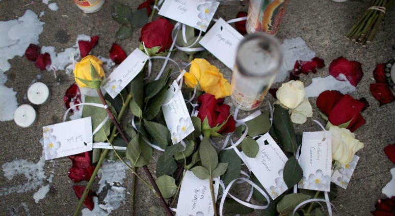 DAYTON, OHIO - AUGUST 06: Flowers bearing the names of those killed in Sunday Morning's mass shooting sits along the sidewalk in the Oregon District on August 06, 2019 in Dayton, Ohio. DAYTON, OHIO - AUGUST 06: Flowers bearing the names of those killed in Sunday Morning's mass shooting sits along the sidewalk in the Oregon District on August 06, 2019 in Dayton, Ohio.