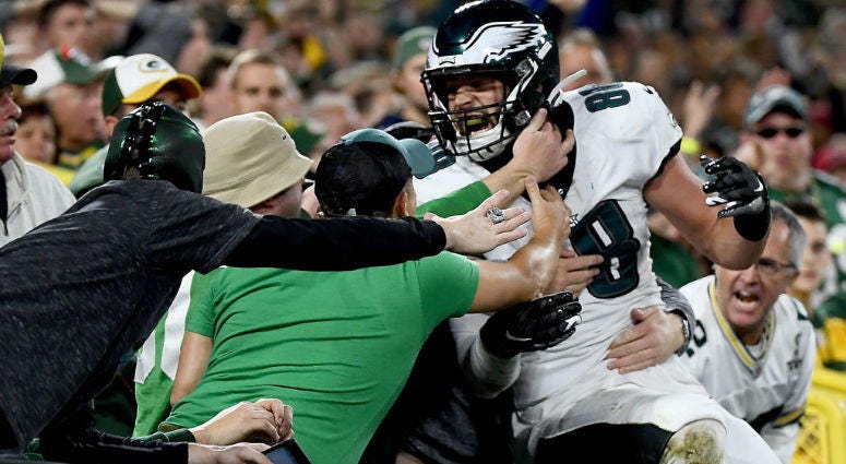 GREEN BAY, WISCONSIN - SEPTEMBER 26: Dallas Goedert #88 of the Philadelphia Eagles celebrates his touchdown with fans in the second quarter over the Green Bay Packers during the game at Lambeau Field on September 26, 2019 in Green Bay, Wisconsin. Dallas Goedert #88 of the Philadelphia Eagles celebrates his touchdown with fans in the second quarter over the Green Bay Packers during the game at Lambeau Field.