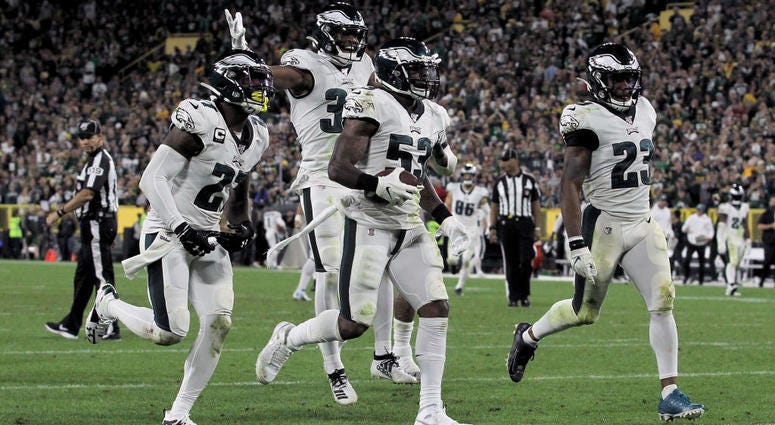 GREEN BAY, WISCONSIN - SEPTEMBER 26: Nigel Bradham #53 of the Philadelphia Eagles celebrates with teammates after making an interception in the fourth quarter against the Green Bay Packers at Lambeau Field on September 26, 2019 in Green Bay, Wisconsin. Nigel Bradham #53 of the Philadelphia Eagles celebrates with teammates after making an interception in the fourth quarter against the Green Bay Packers at Lambeau Field.