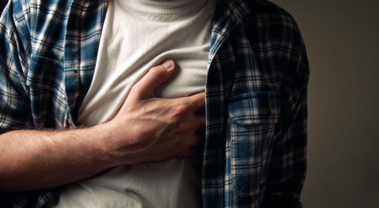 Man with chest pain. Man with chest pain.