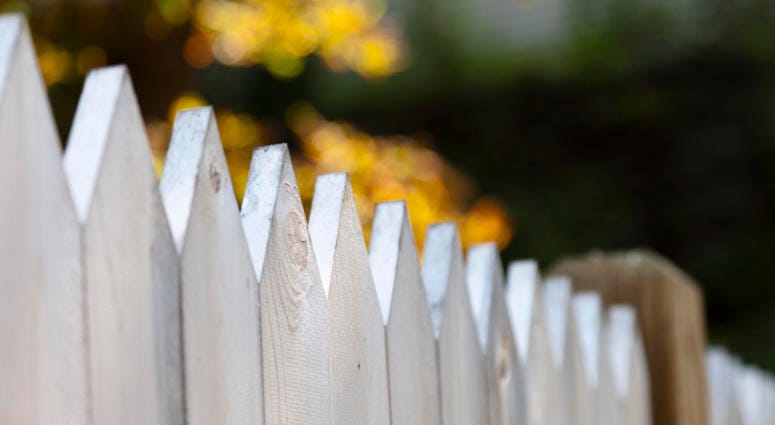 A fence between two homes. A fence between two homes.