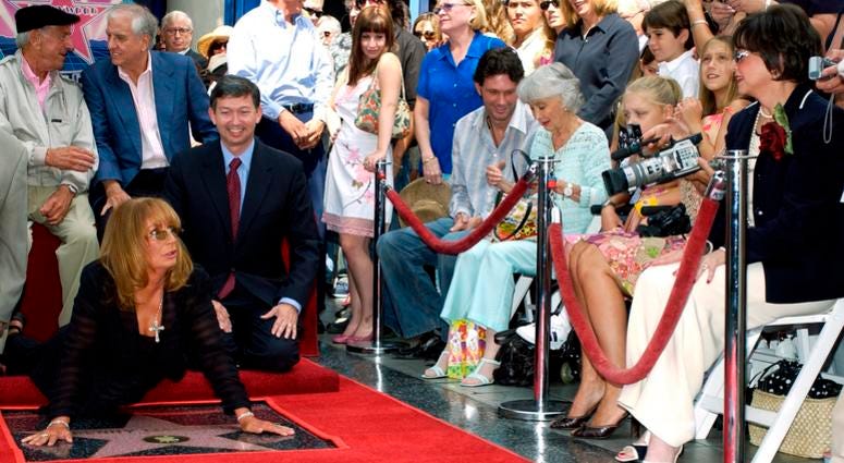 Actress-director Penny Marshall attends the ceremony honoring her and actress Cindy Williams each with a star on the Hollywood Walk of Fame on Aug. 12, 2004 in Hollywood, California. Penny Marshall