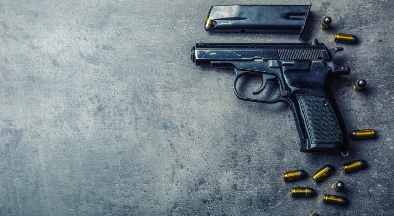 Gun.