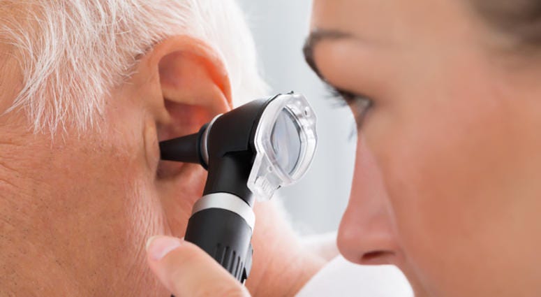 Ear pain. Ear pain getting check out by doctor.