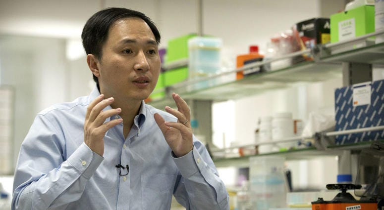 In this Oct. 10, 2018 photo, He Jiankui speaks during an interview at a laboratory in Shenzhen in southern China's Guangdong province. In this Oct. 10, 2018 photo, He Jiankui speaks during an interview at a laboratory in Shenzhen in southern China's Guangdong province.