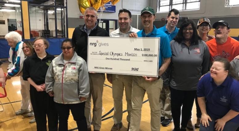 (L) Mike Starck, NRG Retail East Vice President; (C) NRG employee Brett Guerin, who nominated Special Olympics; (R) Scott Otterbein, Montgomery County Special Olympics Manager.
