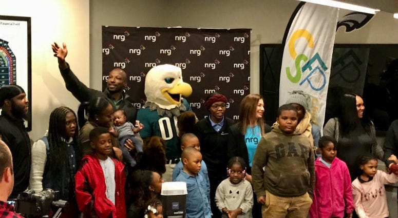 Families find out they win a scholarship at Lincoln Financial Field. Families find out they win a scholarship at Lincoln Financial Field.