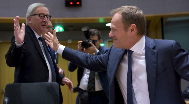 European Commission President Jean-Claude Juncker, left, greets European Council President Donald Tusk during a tripartite social summit at the Europa building in Brussels, Wednesday, March 20, 2019. European Commission President Jean-Claude Juncker, left, greets European Council President Donald Tusk during a tripartite social summit at the Europa building in Brussels, Wednesday, March 20, 2019.
