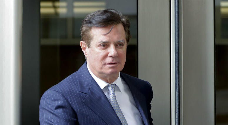 In this Feb. 14, 2018 file photo, Paul Manafort, President Donald Trump's former campaign chairman, leaves the federal courthouse in Washington. In this Feb. 14, 2018 file photo, Paul Manafort, President Donald Trump's former campaign chairman, leaves the federal courthouse in Washington.