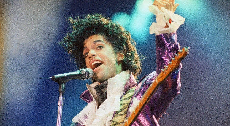 In this Feb. 18, 1985 file photo, Prince performs at the Forum in Inglewood, California. Prince performs at the Forum in Inglewood, California