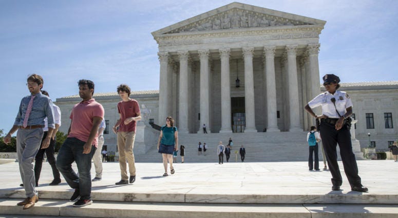 Visitors depart the Supreme Court early Monday, June 25, 2018. The justices are expected to hand down decisions this week as the court's term comes to a close. Visitors depart the Supreme Court early Monday, June 25, 2018. The justices are expected to hand down decisions this week as the court's term comes to a close.