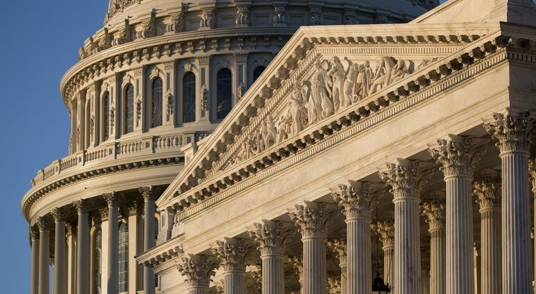 In this Jan. 25, 2017, file photo, the Capitol in Washington at sunrise. The coming battle over a Supreme Court nominee promises to be a bruising one. Capitol in Washington at sunrise