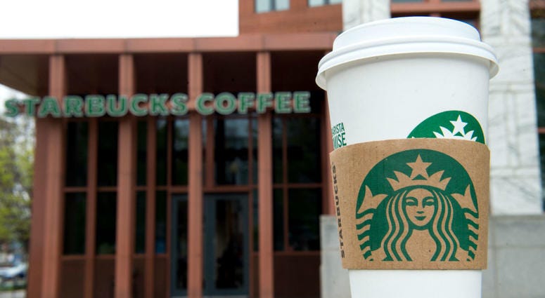 Starbucks is sweetening the pot for employees with a new family care benefit. Starbucks Cup