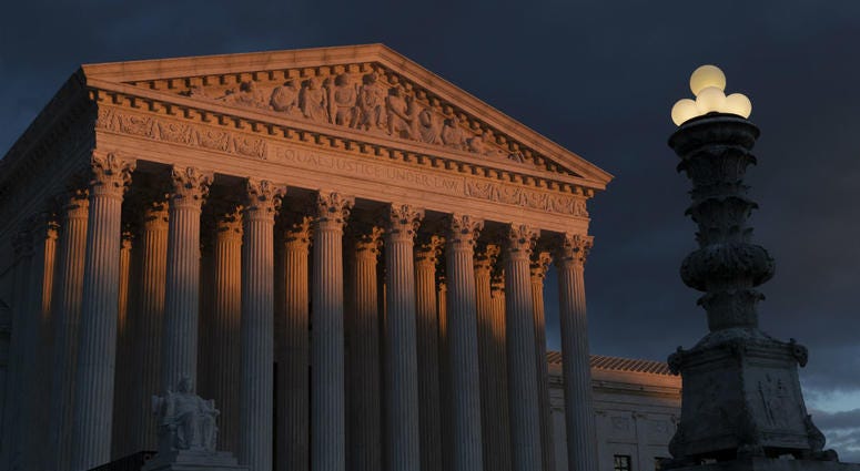 In this Jan. 24, 2019, file photo, the Supreme Court is seen at sunset in Washington. In this Jan. 24, 2019, file photo, the Supreme Court is seen at sunset in Washington.
