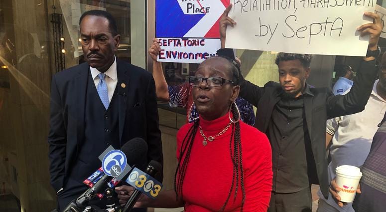 Philadelphia NAACP President Rodney Muhammad and former SEPTA employee Tera Bryant address reporters outside SEPTA headquarters. The organization plans to ask Gov. Tom Wolf's help in addressing a "toxic work environment" at SEPTA. Philadelphia NAACP President Rodney Muhammad and former SEPTA employee Tera Bryant address reporters outside SEPTA headquarters.
