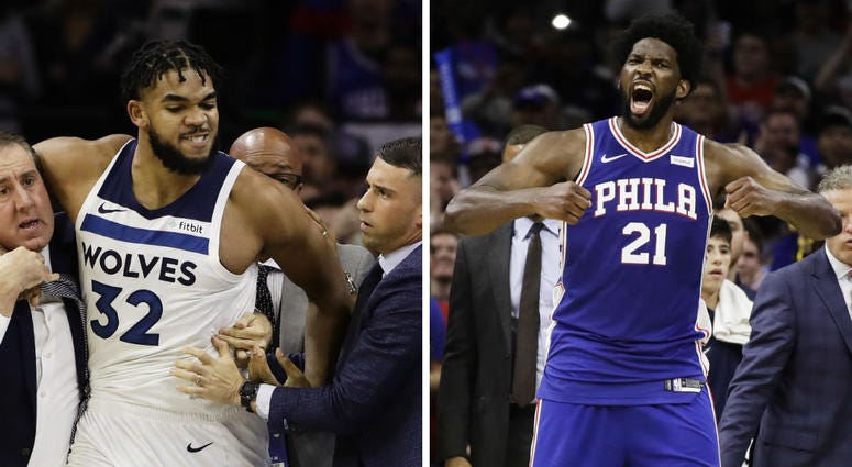 After a fight on court, Philadelphia 76ers' Joel Embiid and Minnesota Timberwolves' Karl-Anthony Towns were ejected during the second half of an NBA basketball game Wednesday, Oct. 30, 2019, in Philadelphia. From left: Minnesota Timberwolves' Karl-Anthony Towns and Philadelphia 76ers' Joel Embiid