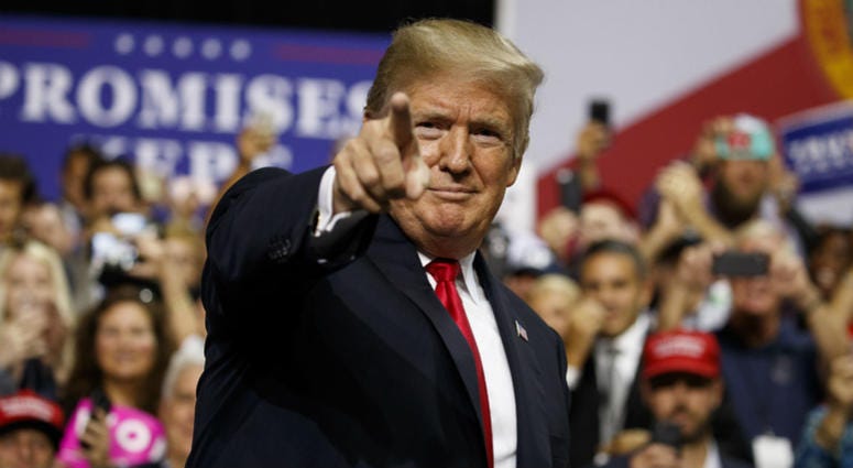 President Donald Trump arrives for a campaign rally at Florida State Fairgrounds Expo Hall, Tuesday, July 31, 2018, in Tampa, Fla. President Donald Trump arrives for a campaign rally at Florida State Fairgrounds Expo Hall, Tuesday, July 31, 2018, in Tampa, Fla.