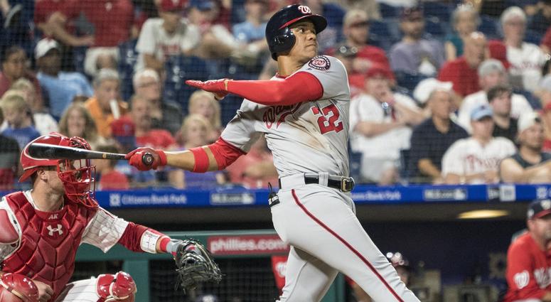 Washington Nationals right fielder Juan Soto (22) hits a three run home run during the ninth inning of the game against the Philadelphia Phillies at Citizens Bank Park. Soto Nationals