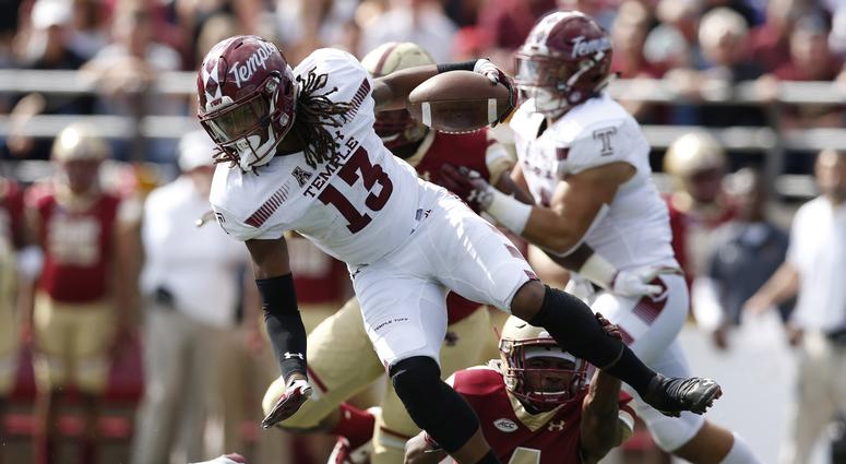 Sep 29, 2018; Chestnut Hill, MA, USA; Temple Owls wide receiver Isaiah Wright (13) is tackled by Boston College Eagles defensive back Hamp Cheevers (4) during the first half at Alumni Stadium. Sep 29, 2018; Chestnut Hill, MA, USA; Temple Owls wide receiver Isaiah Wright (13) is tackled by Boston College Eagles defensive back Hamp Cheevers (4) during the first half at Alumni Stadium.