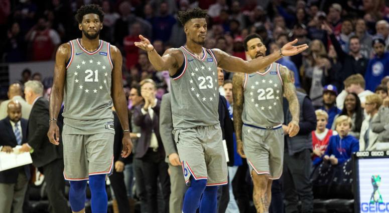 Philadelphia 76ers guard Jimmy Butler (23) reacts to the fans in front of center Joel Embiid (21) during the fourth quarter against the Utah Jazz at Wells Fargo Center. Butler / Embiid