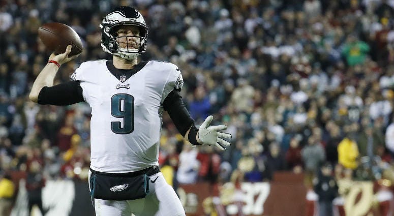 Dec 30, 2018; Landover, MD, USA; Philadelphia Eagles quarterback Nick Foles (9) throws a touchdown pass against the Washington Redskins in the second quarter at FedEx Field. Dec 30, 2018; Landover, MD, USA; Philadelphia Eagles quarterback Nick Foles (9) throws a touchdown pass against the Washington Redskins in the second quarter at FedEx Field.