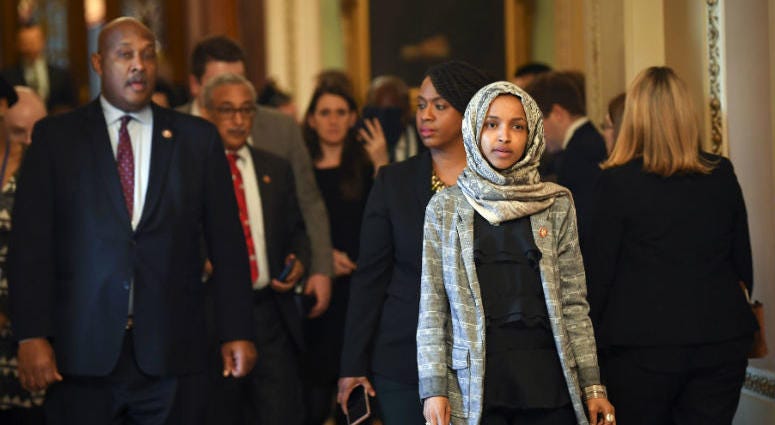 Jan 24, 2019; Washington, DC, USA; Rep. Ilhan Omar (D-MN) and other House Democrat members walking from the Senate Chambers after the Senate voted to reject a pair of dueling bills Thursday to fund the federal government and end the longest partial govern Jan 24, 2019; Washington, DC, USA; Rep. Ilhan Omar (D-MN) and other House Democrat members walking from the Senate Chambers after the Senate voted to reject a pair of dueling bills Thursday to fund the federal government and end the longest partial govern