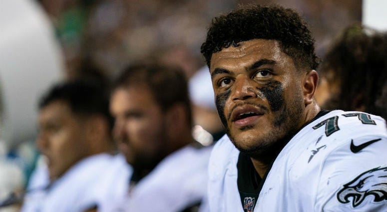 Aug 22, 2019; Philadelphia, PA, USA; Philadelphia Eagles offensive tackle Andre Dillard (77) looks on from the players bench during the second quarter against the Baltimore Ravens at Lincoln Financial Field. Philadelphia Eagles offensive tackle Andre Dillard (77) looks on from the players bench during the second quarter against the Baltimore Ravens at Lincoln Financial Field.