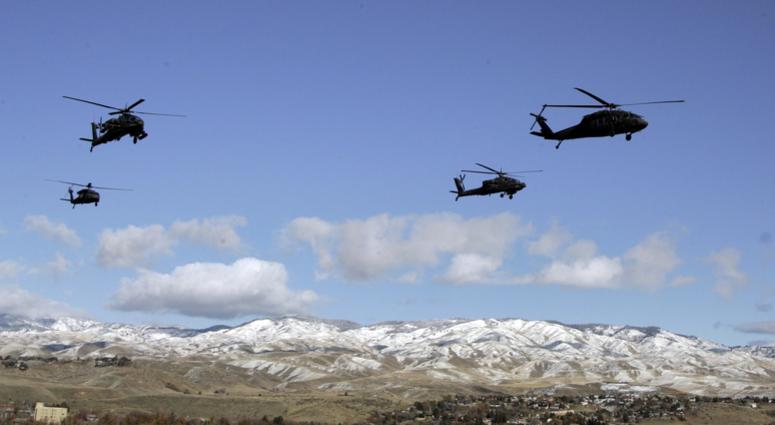 A flight of Apache and Blackhawk helicopter from the Idaho National Guard perform a fly over prior to the first half against the Idaho Vandals at Bronco Stadium. A flight of Apache and Blackhawk helicopter from the Idaho National Guard perform a fly over prior to the first half against the Idaho Vandals at Bronco Stadium.