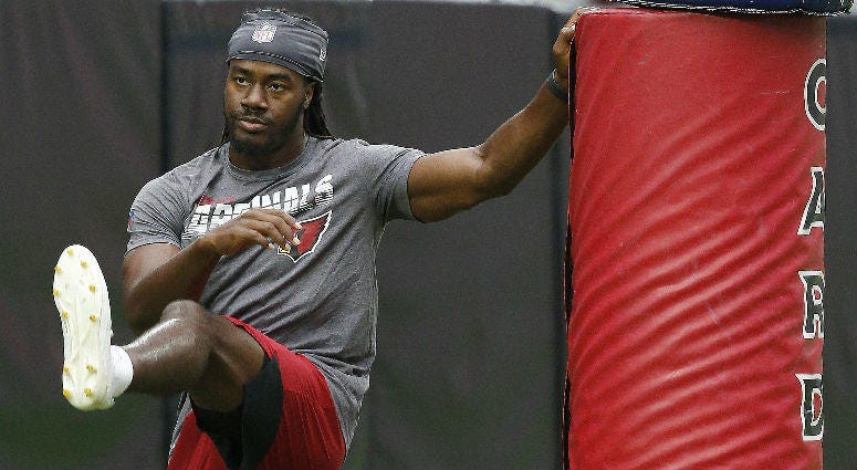 Arizona Cardinals defensive back Josh Shaw stretches before running sprints during preseason training on Wednesday, July 24, 2019. Arizona Cardinals defensive back Josh Shaw stretches before running sprints during preseason training on Wednesday, July 24, 2019.