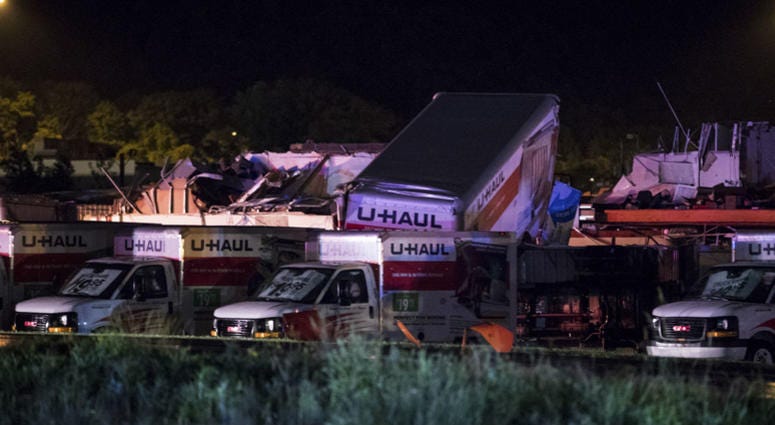 U-Haul trucks parked on Mundy Street in Wilkes-Barre Township, Pa., are damaged after a strong storm moved through the area on Wednesday, June 13, 2018. U-Haul trucks parked on Mundy Street in Wilkes-Barre Township, Pa., are damaged after a strong storm moved through the area on Wednesday, June 13, 2018.