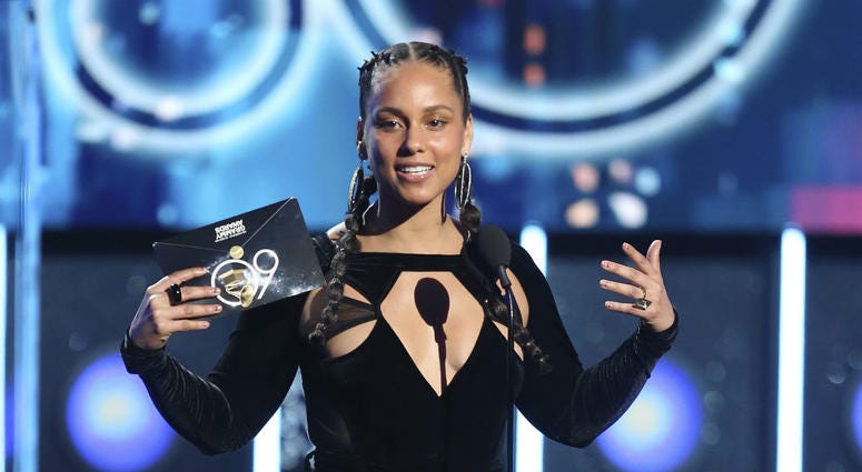 In this Jan. 28, 2018 file photo, Alicia Keys presents the award for record of the year at the 60th annual Grammy Awards at Madison Square Garden in New York. In this Jan. 28, 2018 file photo, Alicia Keys presents the award for record of the year at the 60th annual Grammy Awards at Madison Square Garden in New York.