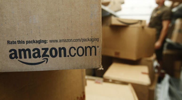 In this Oct. 18, 2010, file photo, an Amazon.com package awaits delivery from UPS in Palo Alto, Calif. In this Oct. 18, 2010, file photo, an Amazon.com package awaits delivery from UPS in Palo Alto, Calif.