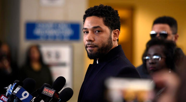 Actor Jussie Smollett talks to the media before leaving Cook County Court after his charges were dropped, Tuesday, March 26, 2019, in Chicago. Jussie Smollett