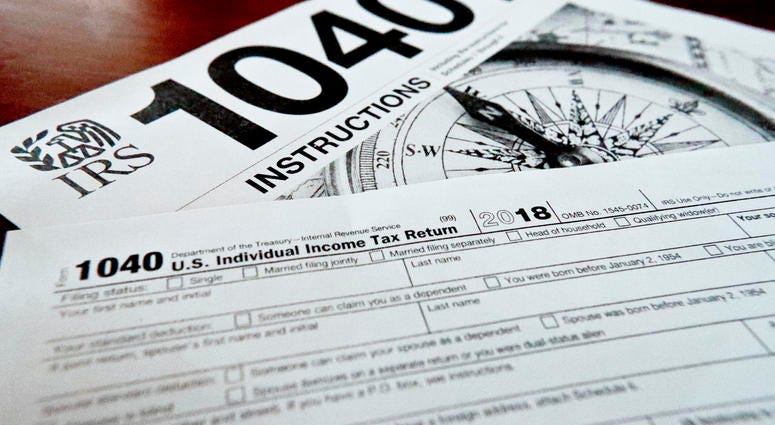 FILE- This Feb. 13, 2019, file photo shows multiple forms printed from the Internal Revenue Service web page that are used for 2018 U.S. federal tax returns in Zelienople, Pa. If you don’t think you will be able to complete and file your taxes on time, re FILE- This Feb. 13, 2019, file photo shows multiple forms printed from the Internal Revenue Service web page that are used for 2018 U.S. federal tax returns in Zelienople, Pa. If you don’t think you will be able to complete and file your taxes on time, re