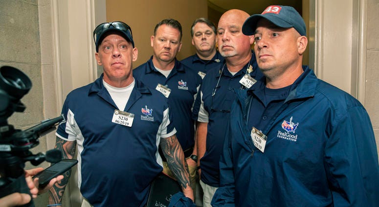 Sept. 11 first responders John Feal, left, Ret. Lt. Michael O'Connell, right, and other first responders speak to reporters as they leave the office of Senate Majority Leader Mitch McConnell, following their meeting at McConnell's office on Capitol Hill. Sept. 11 first responders John Feal, left, Ret. Lt. Michael O'Connell, right, and other first responders speak to reporters as they leave the office of Senate Majority Leader Mitch McConnell, following their meeting at McConnell's office on Capitol Hill.