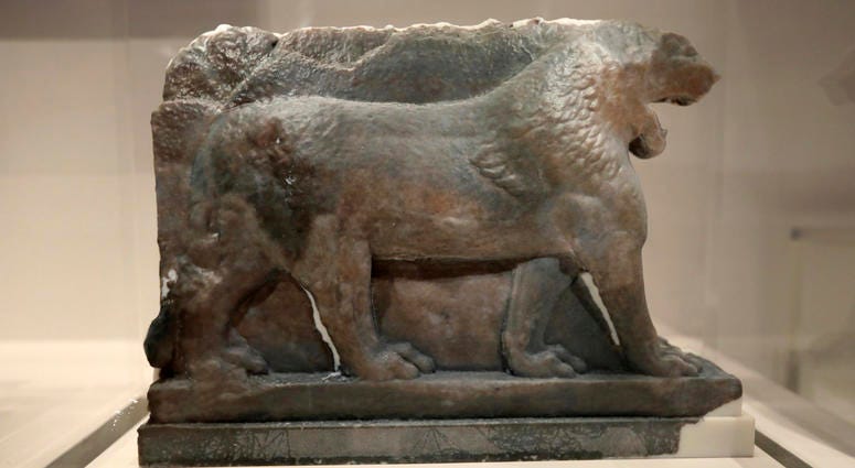 A 3D printed recreation of the ancient Lion of Mosul, which was destroyed by the Islamic State group at the Mosul Museum in Iraq, is displayed as part of the 'What Remains' exhibition at the Imperial War Museum in London, Wednesday, July 3, 2019. A 3D printed recreation of the ancient Lion of Mosul, which was destroyed by the Islamic State group at the Mosul Museum in Iraq, is displayed as part of the 'What Remains' exhibition at the Imperial War Museum in London, Wednesday, July 3, 2019.