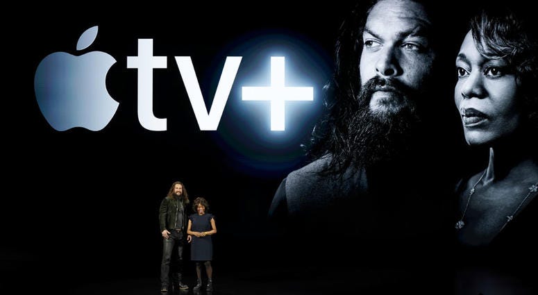 Actors Jason Momoa, left, and Alfre Woodard speak at the Steve Jobs Theater during an event to announce new Apple products Monday, March 25, 2019, in Cupertino, Calif. Actors Jason Momoa, left, and Alfre Woodard speak at the Steve Jobs Theater during an event to announce new Apple products Monday, March 25, 2019, in Cupertino, Calif.