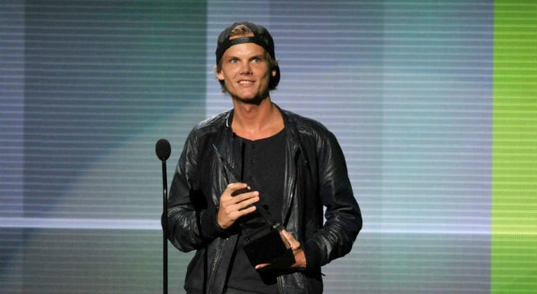 In this Aug. 30, 2013 file photo, Swedish DJ, remixer and producer Avicii poses for a portrait in New York. Swedish DJ, remixer and producer Avicii