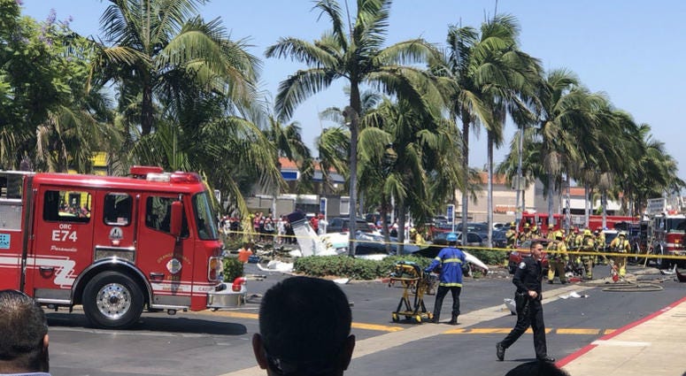 A plane crashed in a parking lot in Orange County, California. Small plane crashes into parking lot, killing 5 in Southern California