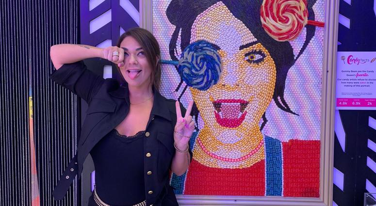 Co-founder Jackie Sorkin stands next to her own candy portrait. Co-founder Jackie Sorkin stands next to her own candy portrait.