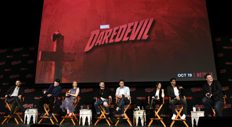 Actors Charlie Cox, Vincent D'Onofrio, Deborah Ann Woll, Elden Henson, Wilson Bethel, Joanne Whalley, Jay Ali and television writer Erik Oleson speak onstage at Marvel's DAREDEVIL panel during New York Comic Con. Actors Charlie Cox, Vincent D'Onofrio, Deborah Ann Woll, Elden Henson, Wilson Bethel, Joanne Whalley, Jay Ali and television writer Erik Oleson speak onstage at Marvel's DAREDEVIL panel during New York Comic Con.