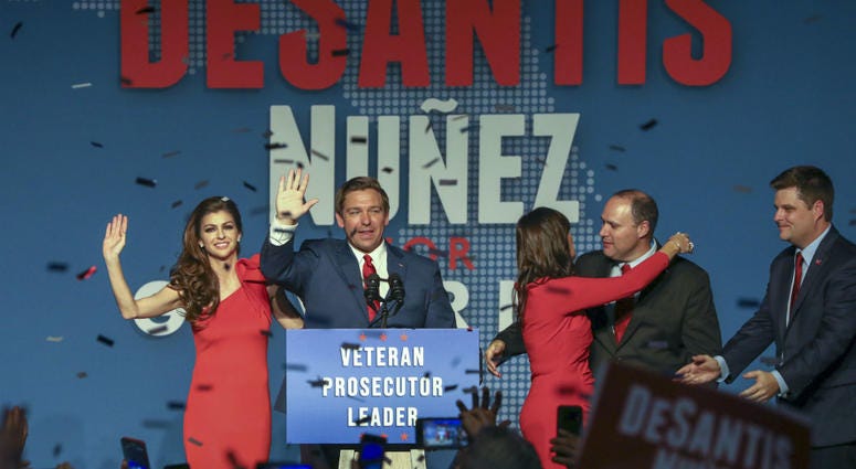Republican Florida Governor-elect Ron DeSantis, center, waves to the supporters with his wife, Casey, left, and Republican Lt. Governor-elect Jeanette Nunez, third right. Republican Florida Governor-elect Ron DeSantis, center, waves to the supporters with his wife, Casey, left, and Republican Lt. Governor-elect Jeanette Nunez, third right.