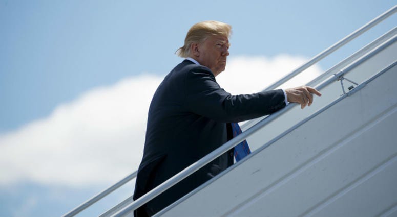 President Donald Trump boards Air Force One for a trip to Singapore to meet with North Korean leader Kim Jong Un, Saturday, June 9, 2018, at Canadian Forces Base Bagotville, in Canada. President Donald Trump boards Air Force One for a trip to Singapore to meet with North Korean leader Kim Jong Un, Saturday, June 9, 2018, at Canadian Forces Base Bagotville, in Canada.