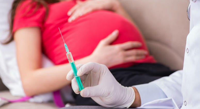 Doctors have made it a priority to recommend pregnant women get a flu shot. Pregnant Woman